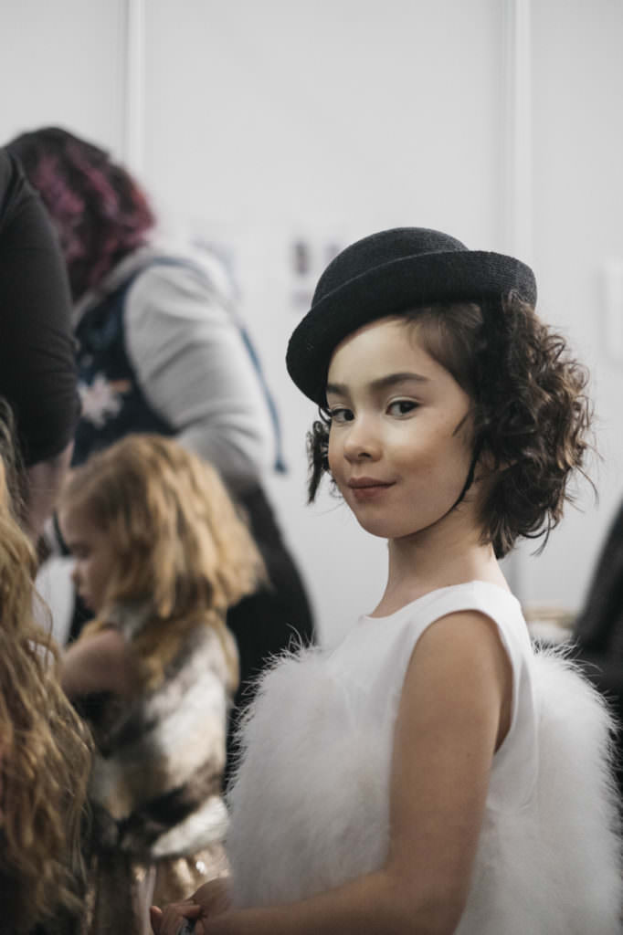 Sweet backstage shot at Petite Parade of Charabia kids fashion fall 2017 photo by Laura Fontaine