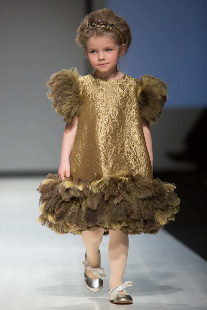 Silk brocade and feathers for a fun party dress by Aristocrat Kids for Holiday 2017