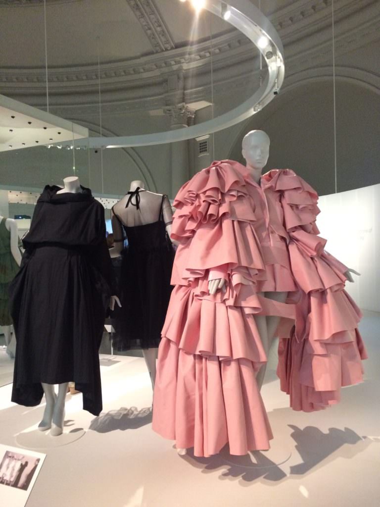 The shock of Balenciaga's sack dress is compared to the shock of Commes Des Garcons increasingly architectural style