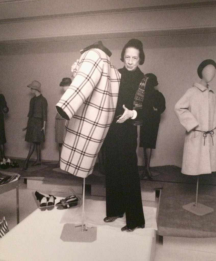 Diana Vreeland shows off the one seam Balenciaga coat for which you can take a simple paper sheet with the pattern and instructions on at the V&A exhibition