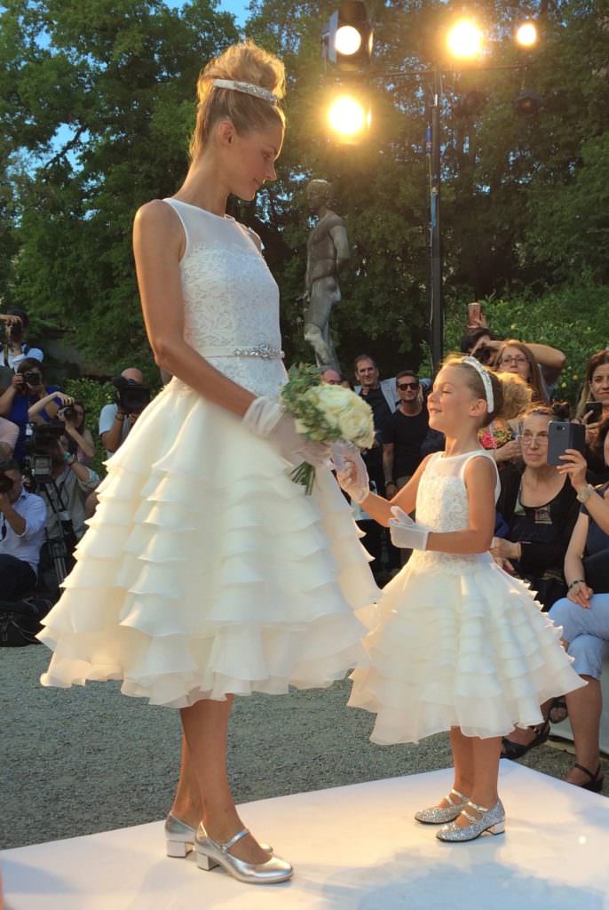 The first time I've seen a bride on the kids catwalk with a Mommy and Me collection at Monnalisa for SS18