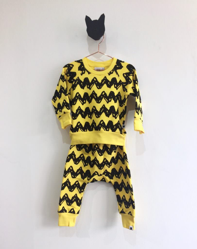 Bold yellow and black zig zags for the Tobias & the Bear kidswear collaboration with Snoppy using the signature yellow tone