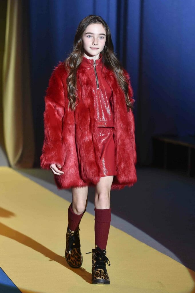 Perfect red tones and shaggy faux fur at Andorinne for fall 2018 kids fashion from Pitti Bimbo