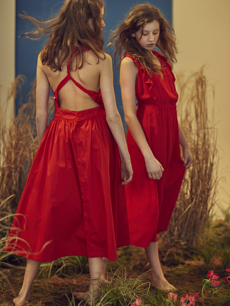 On teen twins Delilah and Tallulah from Kids London Red dress by Bonpoint, Red dress by Des Petits Hauts