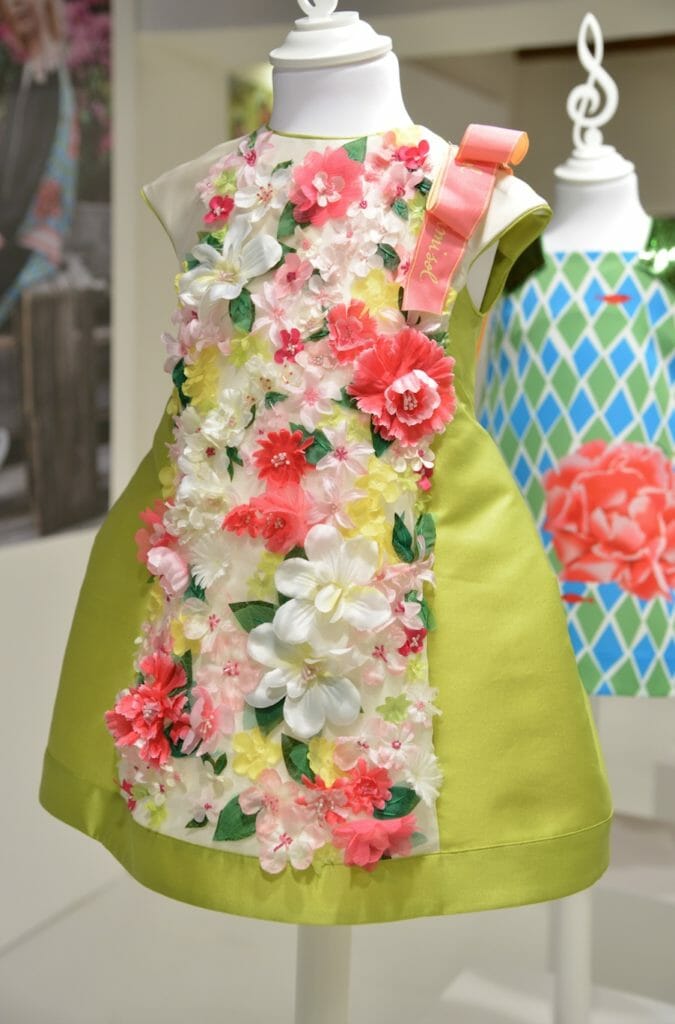 MiMiSol produced a beautiful movie with her own little cinema on her stand this season showcasing her intricate floral decorated girlswear for Pitti Bimbo 87