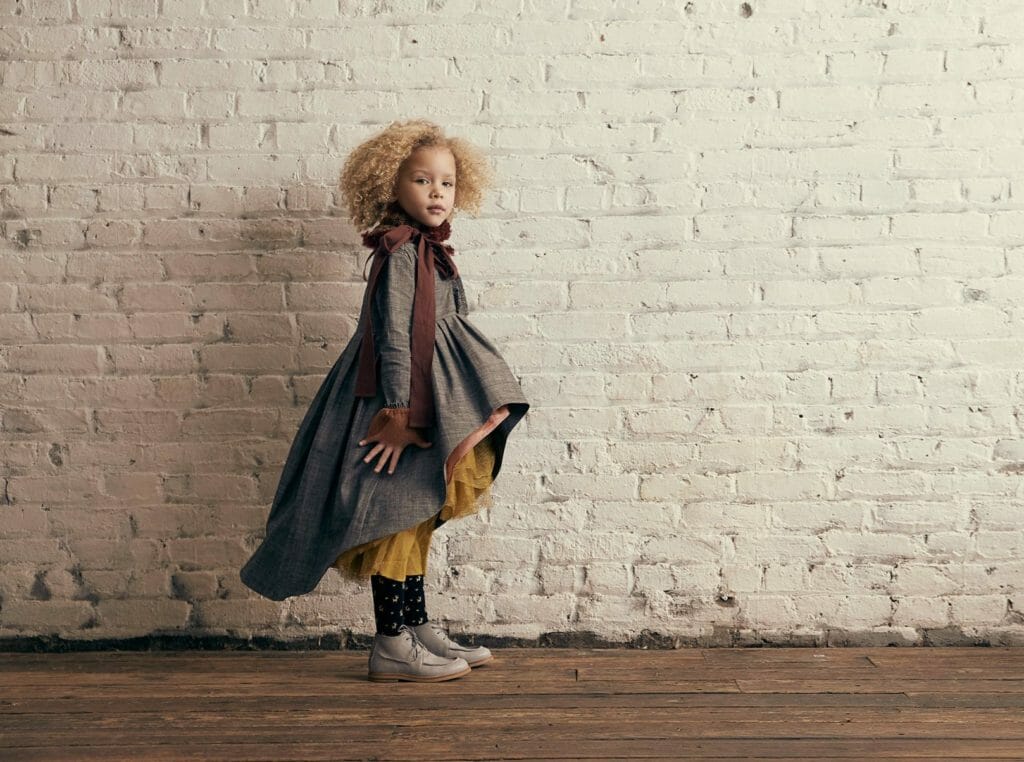 Layered dresses with a historical air at Tia Cibani kidswear for fall 2018