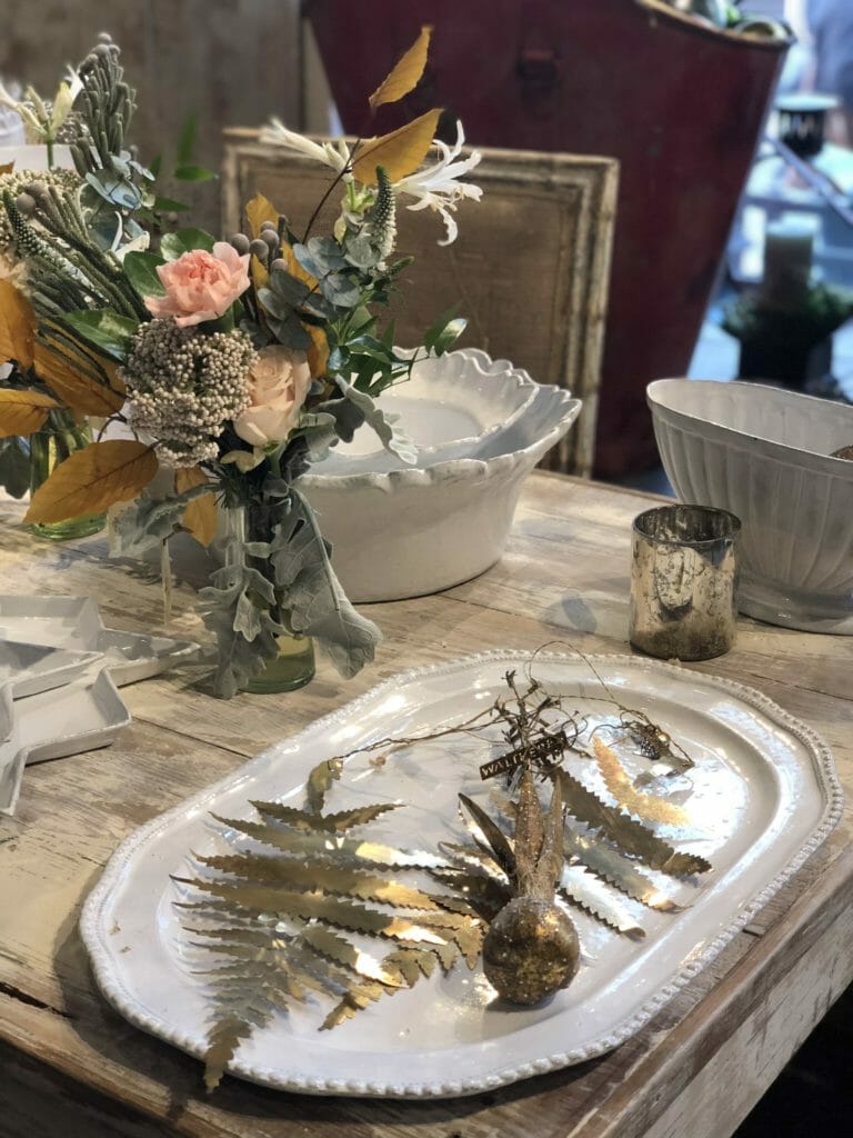Simple Indian inspired metalwork and chic little bouquets at Petersham Nurseries in the Covent Garden store