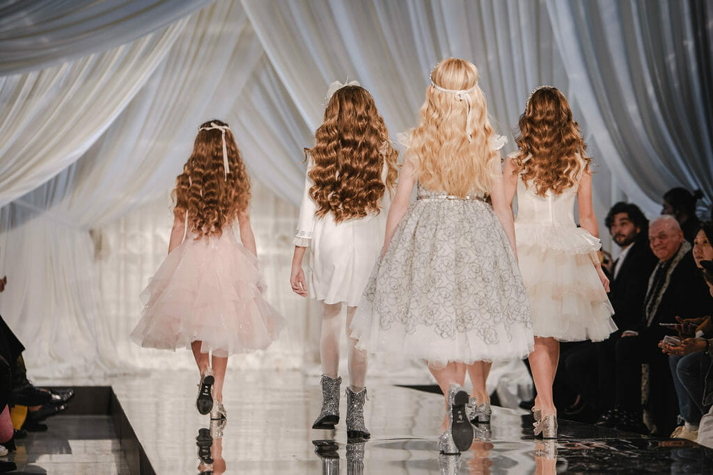 Exclusive kids runway shots by Abi Campbell showing gorgeous Monnalisa couture party dresses for fall/winter 2019