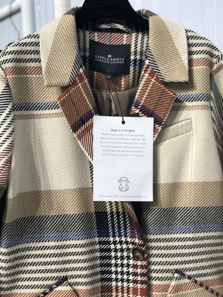 Cool plaid coat by Little Remix which will be renamed Remix Girls for FW19 and a label detailing its recycled wool origins