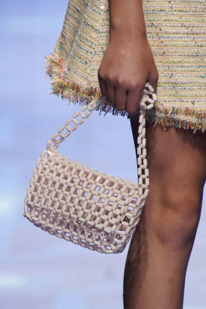 Fringe detail with cool Instagram style open bead bag by Amaya for SS20