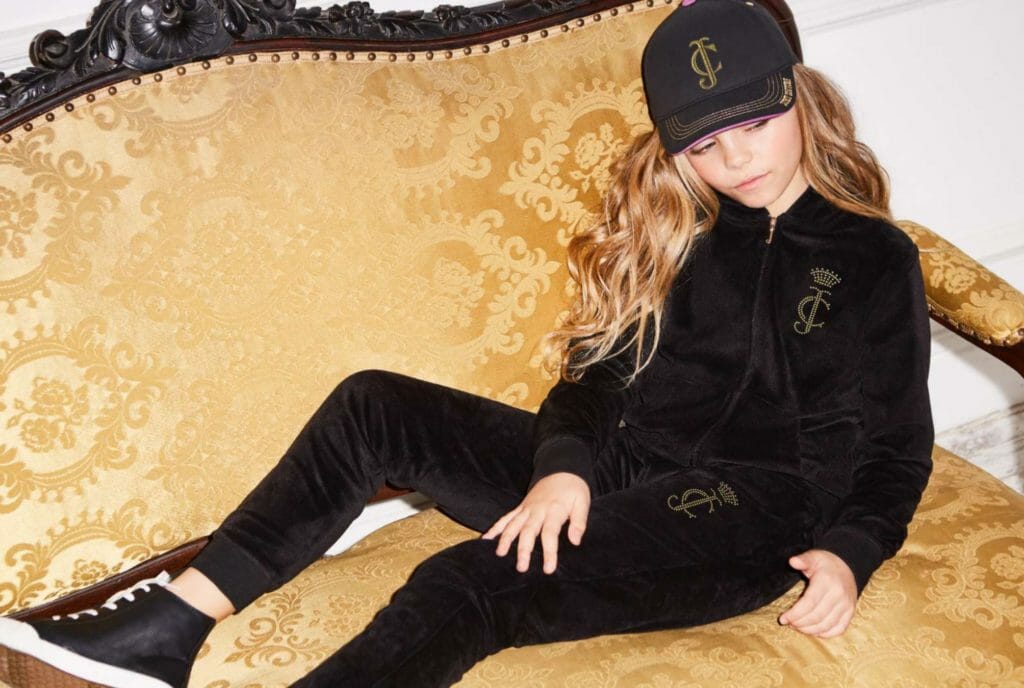 Sports style trends also see the return of the classic velour Juicy Couture track suit in a luxe black version