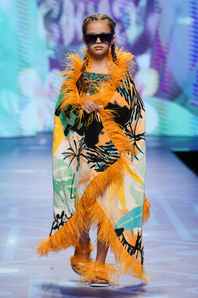 Wonderful Tuc Tuc tropical print swimwear with feathered towel and sandal accessories