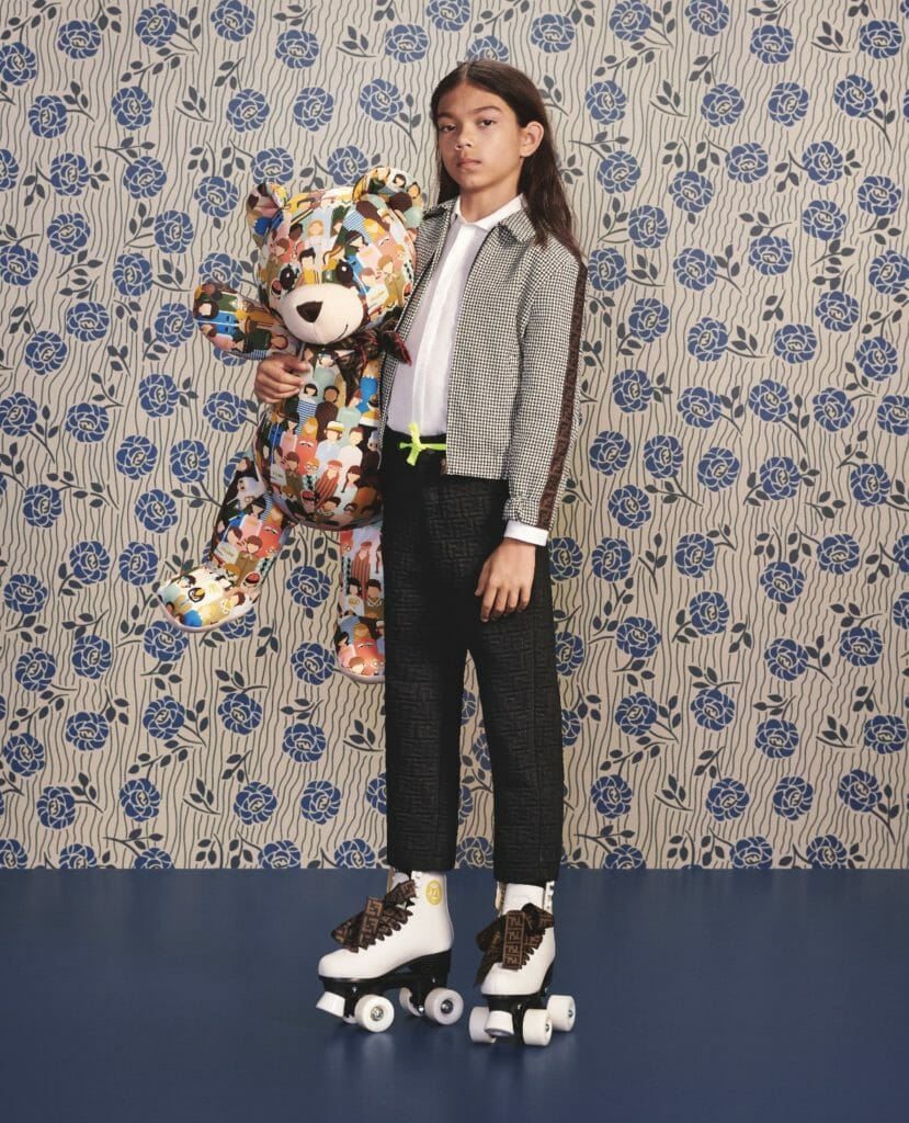 Slick tailoring and logo imprint trousers at Fendi kidswear for fall 2019