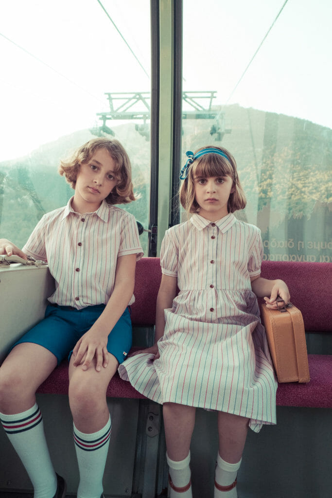 Tres chic Poupée on a summer holiday for SS21 kids fashion