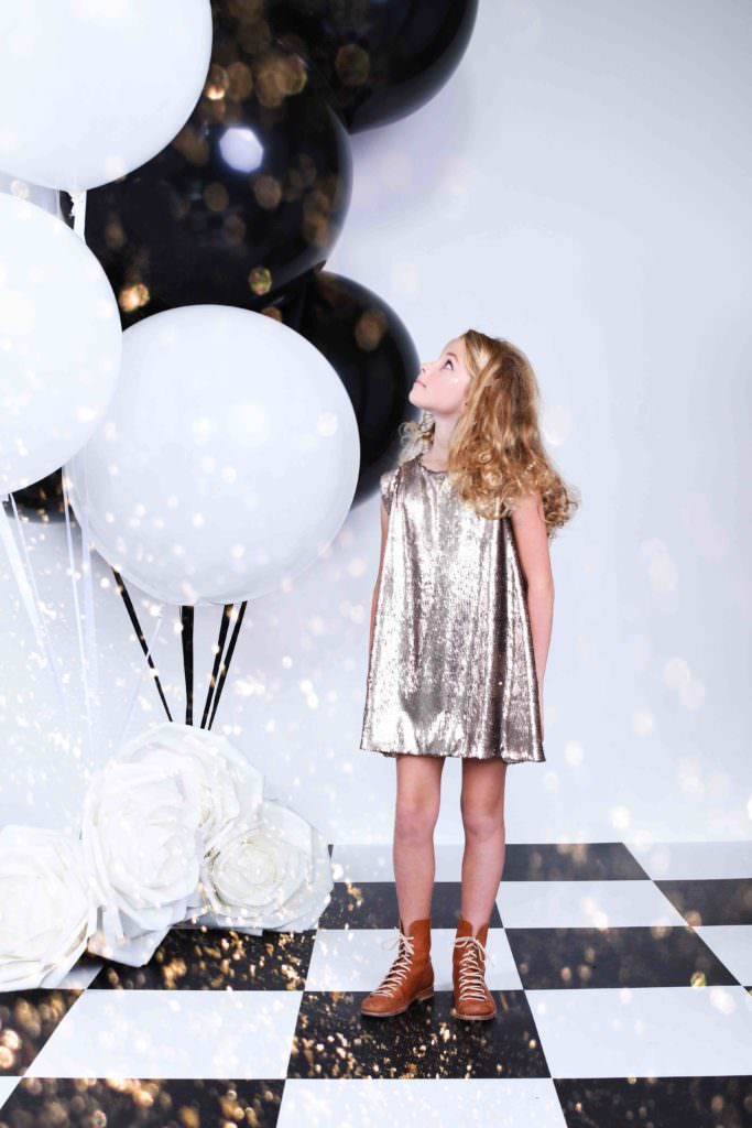 Little Wardrobe London also feature shimmering metallic party dresses for Xmas Holiday 2017