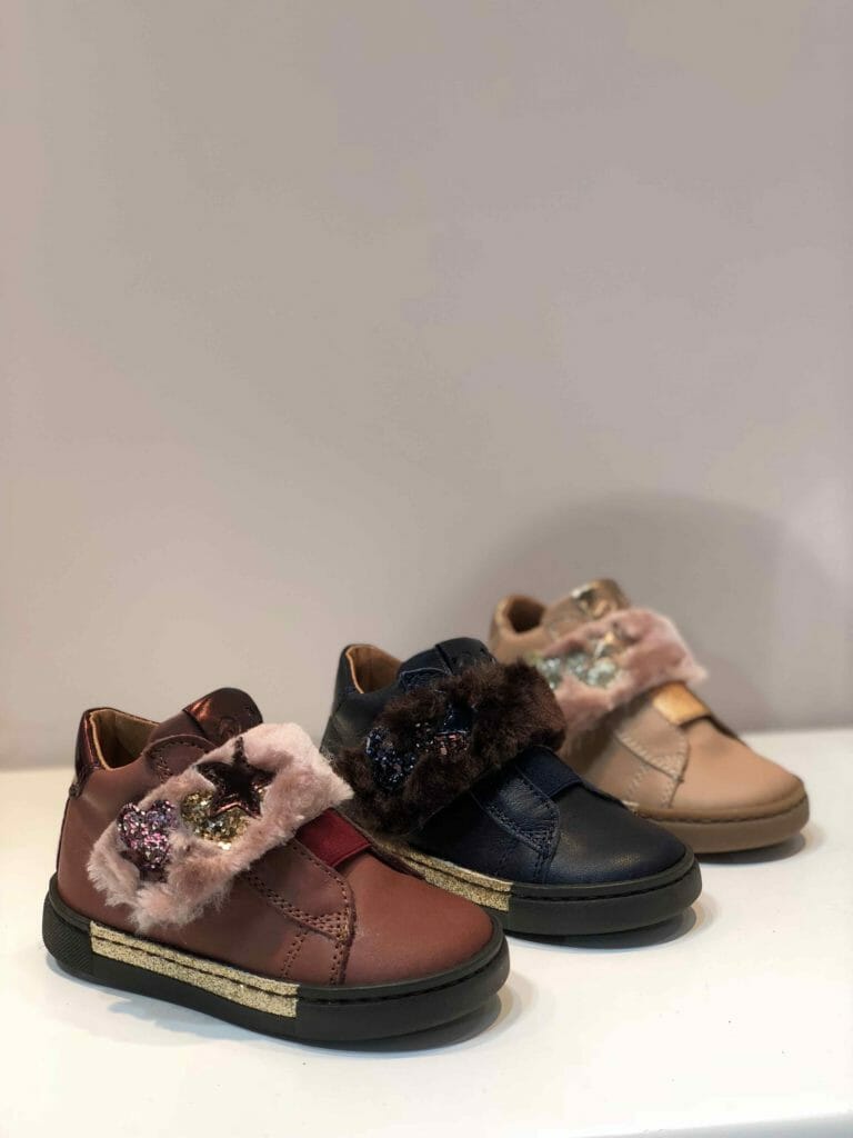 Fur bands studded with star detail at Romagnoli kids footwear fall 2018