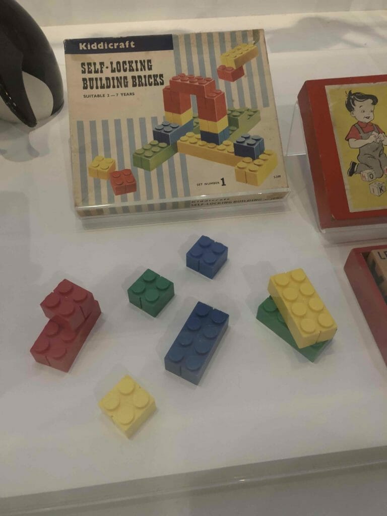 Hilary Page first introduced interlocking bricks for Kiddiecraft in Britain in the 1930's. Lego began production in the 1950's and in 1981 bought all the rights to Kiddiecraft's designs