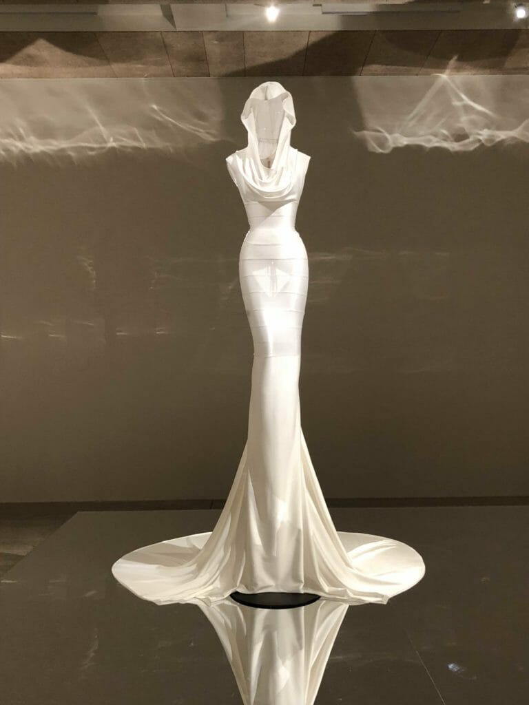 Azzedine Alaïa superb work is well worth a visit with any budding fashion fans as seen in this incredible white wrapped dress from 1996 